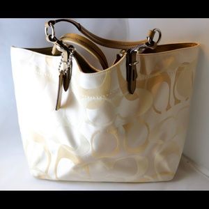 Coach light colored earth tones tote